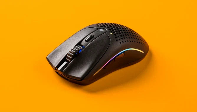 Model O 2 Wireless in Black on an orange background